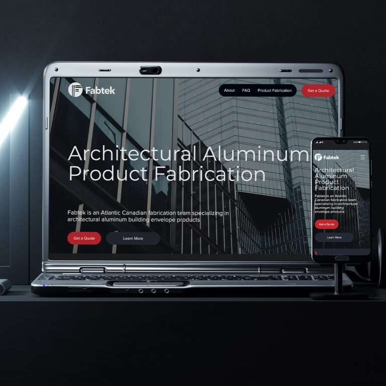 A laptop and smartphone display the Fabtek website, which promotes architectural aluminum product fabrication and professional design services, against a dark background.